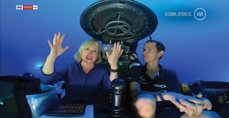 Anna Botting from Sky News shown while live on television using BlueComm 200 UV to communicate wirelessly subsea. Image still from Sky News live broadcast. Photo: Sonardyne