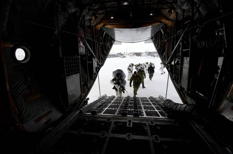 U.S. Army and Canadian Soldiers practiced and conducted tactical insertion on an open ice skiway delivered by an LC-130 Hercules skiplane on frozen oceanic Arctic ice near Cornwallis Island, Nunavut, Canada, during Exercise Guerrier Nordique 2023 in Resolute Bay, Nunavut, Canada. (Photo by Capt.
Mikel Arcovitch, Vermont National Guard Public Affairs)