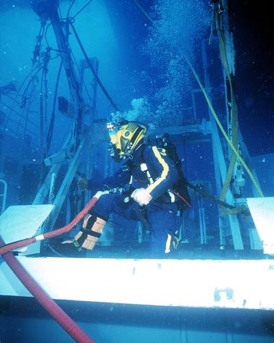 Captain Baumann said that the salvage of the Japanese high school training fishing vessel F/V Ehime Maru – and recovering eight of the nine souls lost off the coast of Hawaii in 2000 ft. – was one of the most technically challenging and personally diffi cult of his career. (US Navy photo)