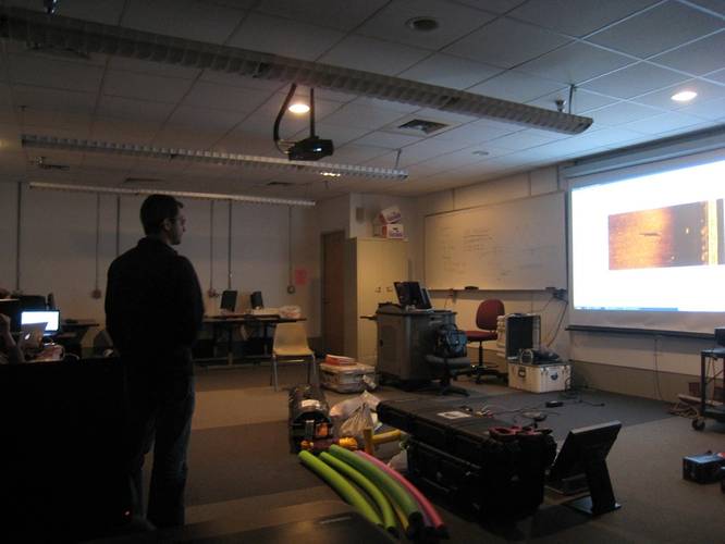 Jose Luis Casaban examines a side-scan sonar image during an exercise to become more familiar with how side-scan data imaged different objects underwater. (Photo courtesy of HYPACK)