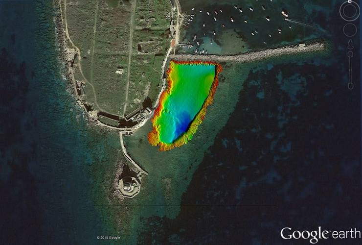 The castle of Methoni (Greece) and color coded the bathymetry of the town’s ancient harbor and submerged breakwater.  (Image: Kongsberg Maritime)