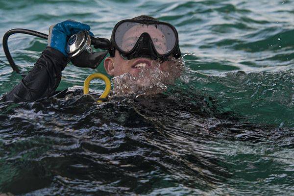 Construction Mechanic 2nd Class Andy Gardner, assigned to Underwater Construction Team (UCT) 2, treads water during a pier assessment with Republic of Korea and Royal Thai Navy UCT at the Thung Prong Pier in Sattahip, Thailand during Exercise Cobra Gold 2018. (U.S. Navy photo by Alfred A. Coffield)