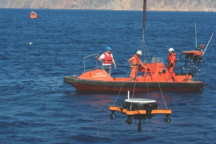 USV deployment with AUV in parking position. (Photo courtesy: Javier Gilabert)