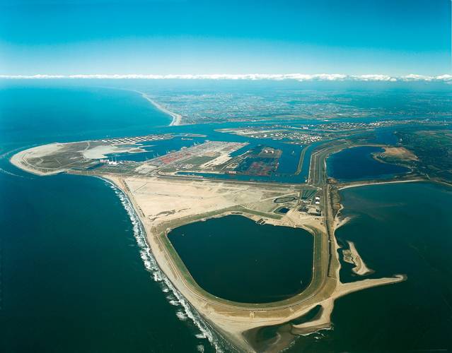 Expanding Port Into the north sea  1965 - 1973 The Netherlands / Maasvlakte 1  The first Maasvlakte extension at the Port of Rotterdam was built by a combination of dikes and sand suppletion reaching west into the North Sea. This expansion made it possible to receive larger ships and build numerous container terminals directly connected by train lines to the hinterlands of the rest of Europe, especially Germany. The extension also created space for the storage of toxic waste and polluted sand in
