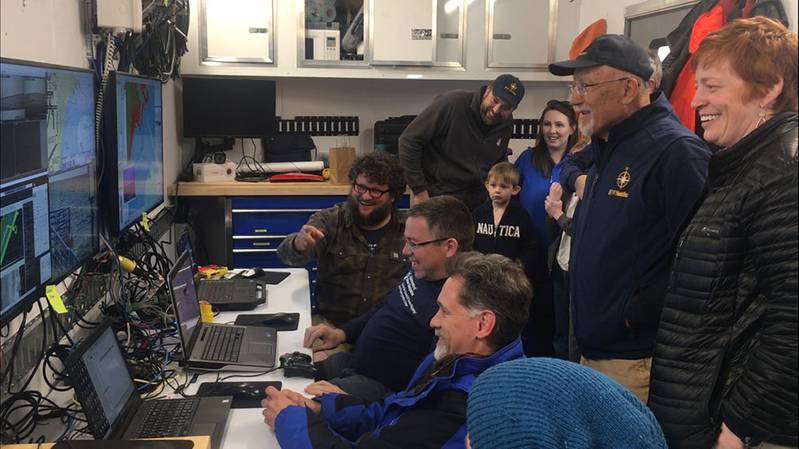 The expedition team hosted visitors to the mission control van to see ASV BEN mapping unfold in real time. (Photo: Ocean Exploration Trust)
