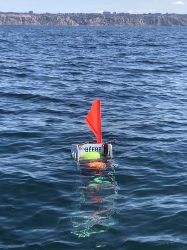 Figure 1.  Ocean Lander DOV BEEBE surfaces off the coast of La Jolla, California.  (Photo by Ashley Nicoll, Scripps Institution of Oceanography/UCSD)