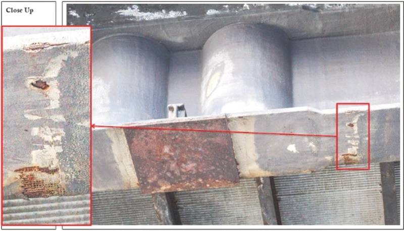 Figure 4: This UAS survey image shows 100% coating breakdown and surface corrosion in the primary member between two grid points, along with exposed reinforcing mesh in the insert. (Credit: Cyberhawk)