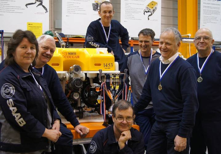 First year’s 5S ChampionsLeague winners – Small Assembly Team – from left to right Shirley Mundy, Tim Moon, Aaron Jenkinson, Martin Lennon,DavidPycroft, Team Leader, Ken Baseley and Adrian Dixon, kneeling.