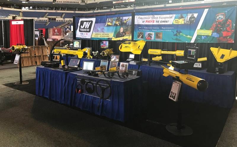 JW Fishers set up shop in a booth in the Lucas Oil Stadium and brought its entire product line to display, demo and discuss. (Photo: JW Fishers)