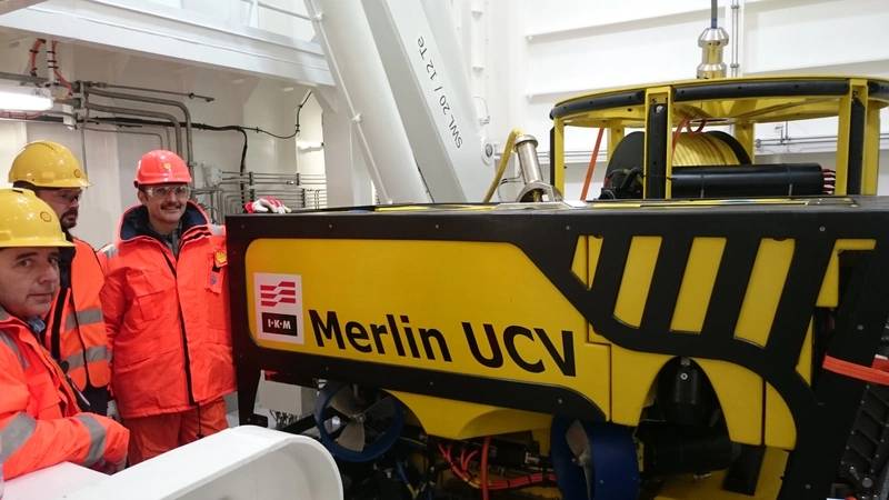 from left: Jan Furnes, (Norske Shell technical warehouse and workshop lead,)  Ben Pollard, (Managing Director, IKM Subsea) and Trond Bjørshol (Norske Shell Subsea Maintenance Lead with the Merlin UCV in ROV hangar on-board Siem Pride. (Photo: IKM)