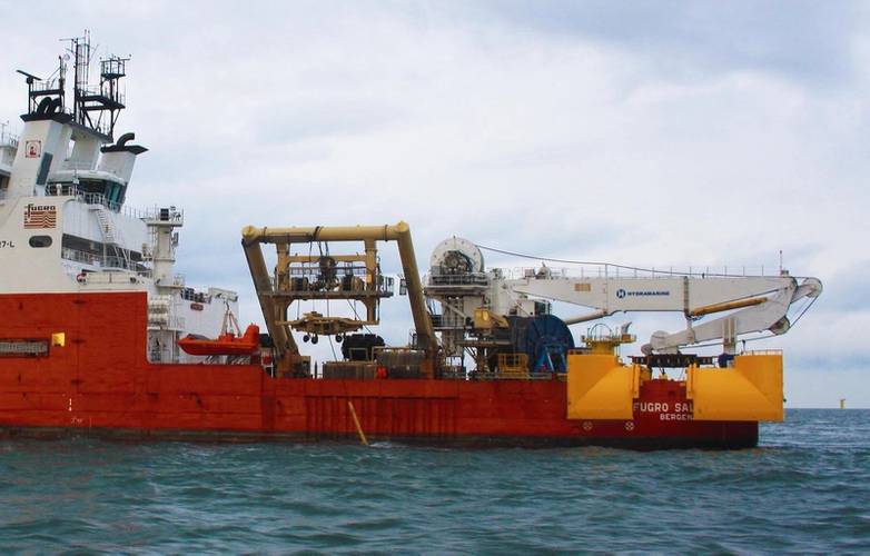 The Fugro Saltire showing the winch deploying Fugro’s Q1400 trencher and at the stern the cable-lay spread system.