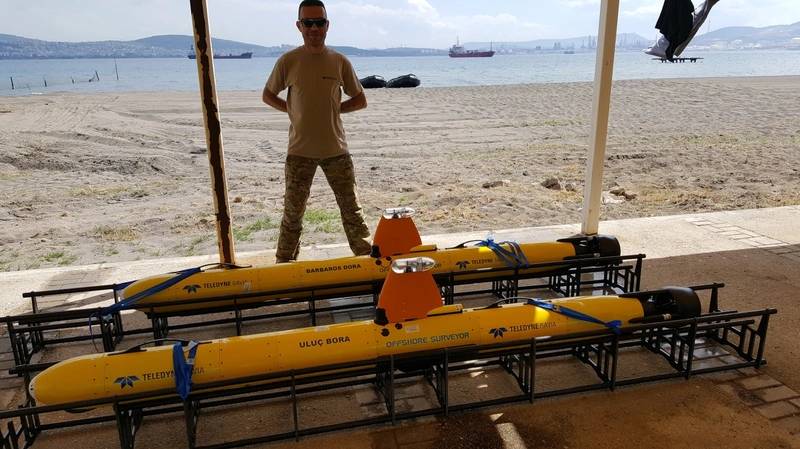 Gavia local partner, Ozan Durmus of EKD Company, and a pair of Turkish Air Force Gavia Vehicles (Photo: Teledyne Gavia)