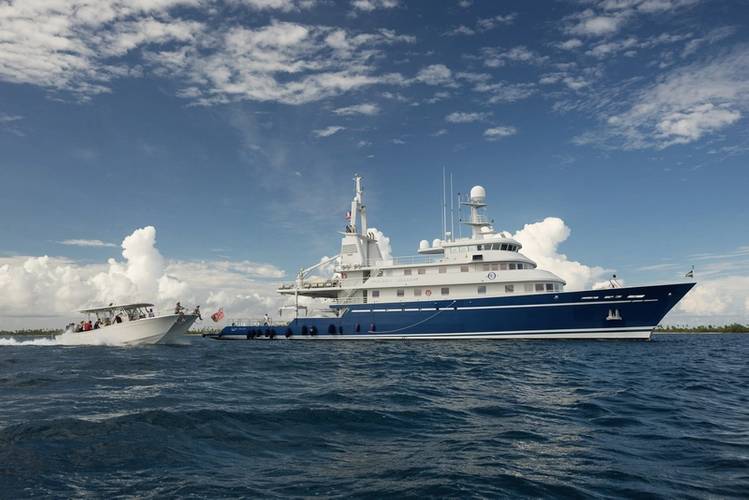 M/Y Golden Shadow with dive vessel, the Calcutta. Copyright Michele Westmorland 2013