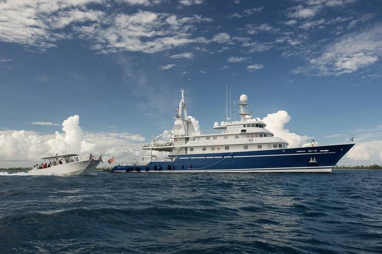 M/Y Golden Shadow with dive vessel, the Calcutta. © Michele Westmorland /iLCP