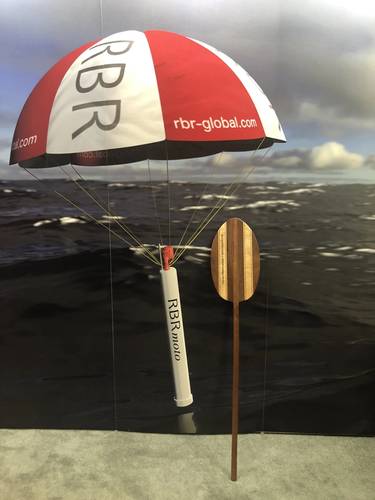 RBR Hosted the OceanObs’19 Honorary Paddle on the Showcase Floor.  Photo: Justin Manley