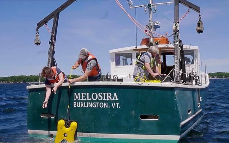 Pete Kerson, Program Manager and Naomi Harrison, Junior Robotics Engineer launching VideoRay defender during water trials testing new software (Photo: Greensea)