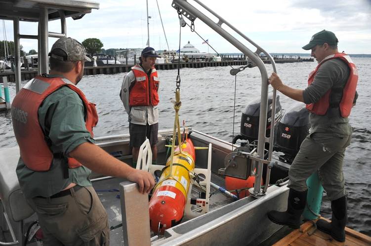 MBARI engineer Brian Kieft with researchers from the U.S. Geological Survey (USGS) on board the USGS vessel with the Tethys LRAUV, in the southern portion of Lake Michigan (Credit: Brett Hobson © 2016 MBARI)