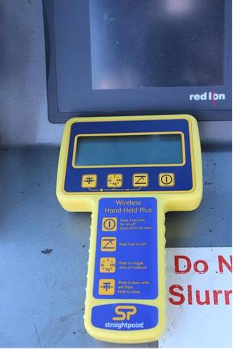 Measurements are taken on a wireless Hand Held Plus in the cab of the dredge. (Photo: Straightpoint)