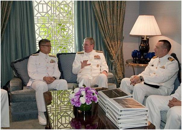 Vice Adm. John Miller visits with Vice Adm. Masao Kawamura, Japan Joint Staff/J3, left, before meeting with Shinzo Abe, the Prime Minister to Japan. (U.S. Navy photo by Danielle Brandt)