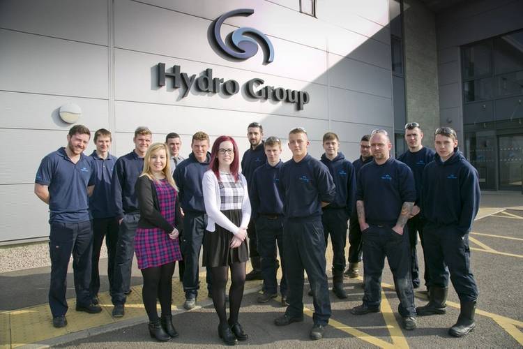 L-R: Nathan McFarlane, Technician; Fraser Thomson, Technician; Scott Fowlie, Materials Controller; Jonathan Stalker, Design Engineer; Connor Rennie, Materials Controller; Andy Morrison, Machinist; Jack Sim, Quality Inspector; Paul Lamb, Maintenance Engineer; Graeme Phillips, Machinist; Mike Sim, Maintenance Engineer; John Brownlie, Senior Quality Inspector; Scott Lynch, Machinist; Sherri Cocker, Accounts Coordinator; and Emma Gibson, Sales Coordinator
