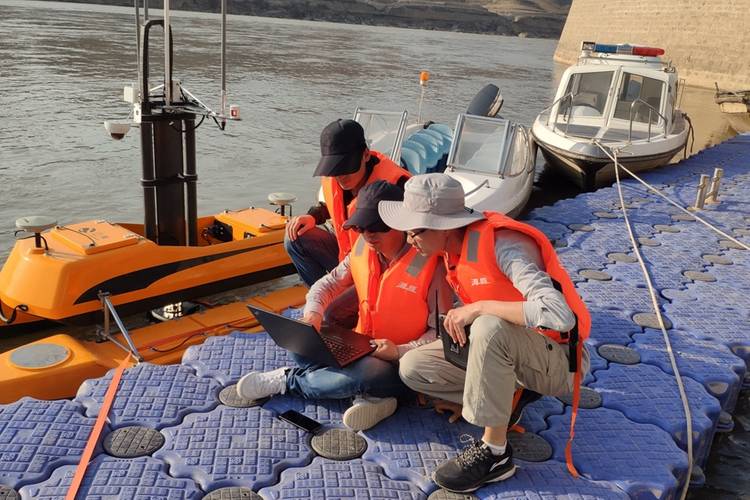 Personnel install and debug equipment at the dock. Image: OceanAlpha