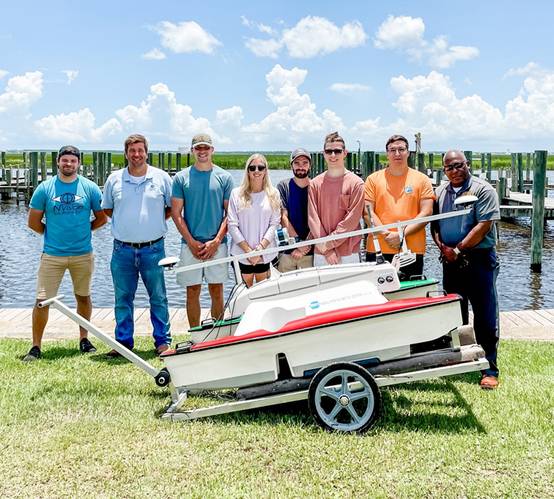 Pictured Left to right: Ryan Dodd, - Hydrographer, NVision Solutions, Inc. | Associate Professor, NOARC; Joel Lawhead – Vice President, Nvision Solutions, Inc. Associate Professor, NOARC; PRCC Students: Caleb Spence, Heather Dinger, Wesley Parker, Alex Moon, Billy Snowden; and Raymunda Barnes- Assistant Vice President, PRCC. Photo courtesy NOARC