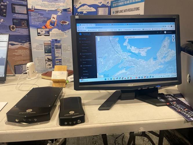 Pinpoint Earth, tracking and monitoring fishing vessels globally. Photo Celia Konowe