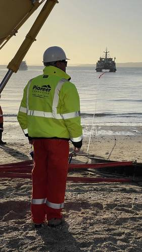 Pioneer Consulting team member oversees the landing of subsea cable. Credit: Pioneer Consulting.
