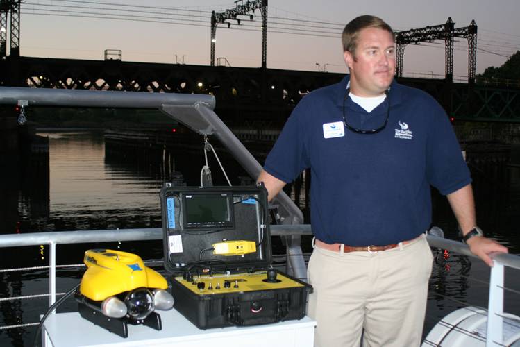 New research vessel for The Maritime Aquarium at Norwalk comes with a VideoRay ROV equipped with cameras that will allow students to explore the bottom of Long Island Sound, shipwrecks in the Sound and more. Shown with Aquarium Educator Colin Thom. 
