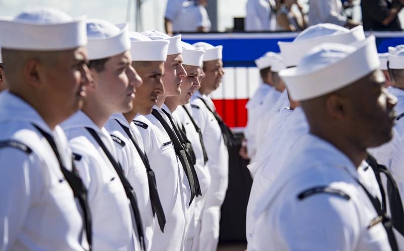Sailors stand in formation, waiting to bring the ship to life, during the commissioning ceremony for the Virginia-class attack submarine USS Washington (SSN 787) at Naval Station Norfolk. (U.S. Navy photo by Patrick T. Bauer)
