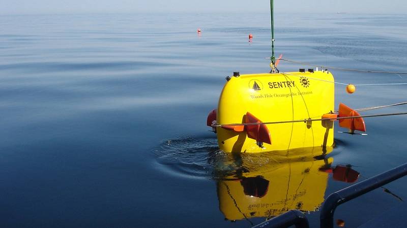 WHOI scientists used deep-sea vehicles, including Sentry, to locate the voyage data recorder (above) from the El Faro on the seafloor 15,000 feet deep. The VDR offers clues to understand why the ship tragically sank in 2015, killing 33 crew members aboard. (Photo: Chris German, Woods Hole Oceanographic Institution)