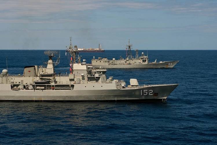 HMA Ships Warramunga (FFH-152) and Sydney (FFG-03) conducts a patrol in the vicinity of the oil production facility, the Modec Venture II, 150km off the north west coast of Australia as part of Ex Blue Raptor 2013. Photo: LSIS Brenton Friend