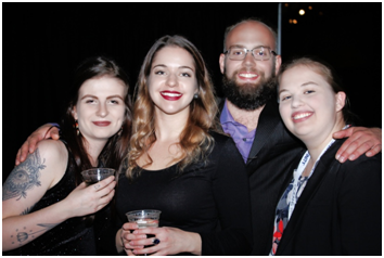 Students and young professionals enjoying the reception.  (Photo courtesy of Rick A. Smith) 