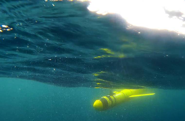 A submarine glider, owned by Blue Ocean Monitoring, prepares for its first dive after being deployed off Orkney (Photo: NOC)