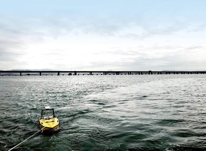 Testing the USV’s systems in a bay near Qingdao, China. The test includes boat stability (by hauling/dragging the vehicle) and communication quality. Photo: Nortek