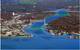 The Bourne Tidal Test Site will be installed on the left side of the railroad bridge next to the Army Corps of Engineers secure facility. Photo of the Cape Cod Canal looking from Buzzards Bay to Cape Cod Bay (Image: MRECo)