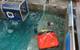 A life raft is brought near to the cabin to pick up survivors/escapees. (Photo: Tom Mulligan)