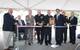 Cutting the ribbon, from left, Dominic Galluci, P&S Construction; RI Congressman James Langevin; RI Governor Lincoln Chafee; Rear Adm. Michael Jabaley, commander, NUWC; Capt. Todd Cramer, commander, NUWC Division Newport; Mark Rodrigues, head NUWC's Platform and Payload Integration Department; Blair Decker, General Dynamics/Electric Boat; and RI Senator Jack Reed.