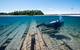 A NOAA diver swims over the shipwreck site of the wooden two-masted schooner Portland within Thunder Bay National Marine Sanctuary. (Photo: NOAA)