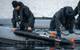 Dutch Navy REMUS (Remote Environmental Monitoring Units)Team recovers the Autonomous Underwater Vehicle while performing a bottom of the sea reconnaissance prior amphibious maneuvers during Trident Juncture 18 . Trident Juncture 18 is designed to ensure that NATO forces are trained, able to operate together and ready to respond to any threat from any direction. Trident Juncture 18 takes place in Norway and the surrounding areas of the North Atlantic and the Baltic Sea, including Iceland and the 