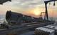 Figure 1: With the sun rising over the horizon, the coring rig sits ready for deployment. Image courtesy of A. Herre-ra- Schneider.
