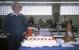 Frank Massa with his 'transducer cake.' Photo courtesy Massa