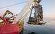 Seas Geosciences crews lower their remotely operated geotechnical device into the water to sample and test seabed soils on the Med Wind project. (Credit: Seas Geosciences)