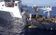 The AUV Hydroid Remus 6000 is deployed from the R/V Petrel in search of the USS Indianapolis. (Photo courtesy of Paul G. Allen)