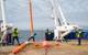 The in-situ 'Cocktail' incubator (Chamber Oxygen Collector Kit Tracer Analyser Insitu Logger) is recovered. First to be brought on board are a series of bright floats beneath which, a few hundred meters below, is the 'Cocktail' incubator. This specialized piece of equipment, built using titanium and glass allows the science team to monitor the activity of microbes in the water column at in situ oxygen, temperature and pressure. 
Credit: Alex Ingle / Schmidt Ocean Institute