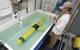 The OOI is not just made up of instrument systems anchored to the sea floor. Ocean gliders such as this one move between and beyond the moorings for months at a time, measuring temperature, salinity, and other critical ocean properties that help scientists understand what is happening far beyond the anchored moorings. The vehicles have no motor: they literally glide through the water by changing their buoyancy.  (Photo by Tom Kleindinst, Woods Hole Oceanographic Institution)