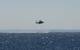 A JMSDF MCH-101 mine warfare helicopter rakes for mines in Mutsu Bay during 2JA 2017 Mine Countermeasures Exercise (2JA-17 MCMEX). 2JA Mine Countermeasures Exercise is an annual bilateral exercise held between the U.S. Navy and Japanese Maritime Self Defense Force to strengthen interoperability and increase proficiencies in mine countermeasure operations. (Photo by William McCann)