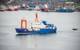 St. John's, Newfoundland, Canada- OceanGate-June 2023: Polar Prince towing OceanGate Expeditions submersible vessels on a barge as it leaves for the Titanic wreck site to tour below the ocean.
Copyright Dolores Harvey/AdobeStock