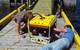Laboratory Director Dr. Ralf Bachmayer (right) and PhD student Brain Claus preparing the Falcon for an AUV retrieval mission – one of its roles at AOSL.
