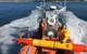 MBARI researchers head out into Monterey Bay to deploy a long-range autonomous underwater vehicle (LR-AUV), an underwater robot that is programmed at the surface and then travels underwater for hundreds of miles, measuring water chemistry and collecting water samples as it goes.  Credit: Brian Kieft (c) 2015 MBARI